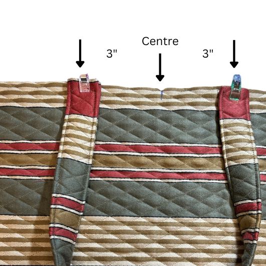 Striped fabric with measurements indicated on a white background