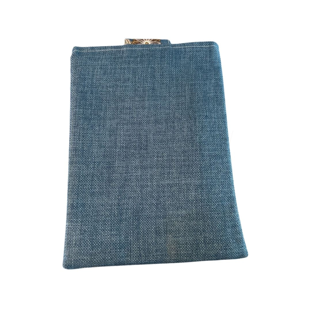 Teal and gold floral tablet case with front pocket and snap closure, made from repurposed fabric back view