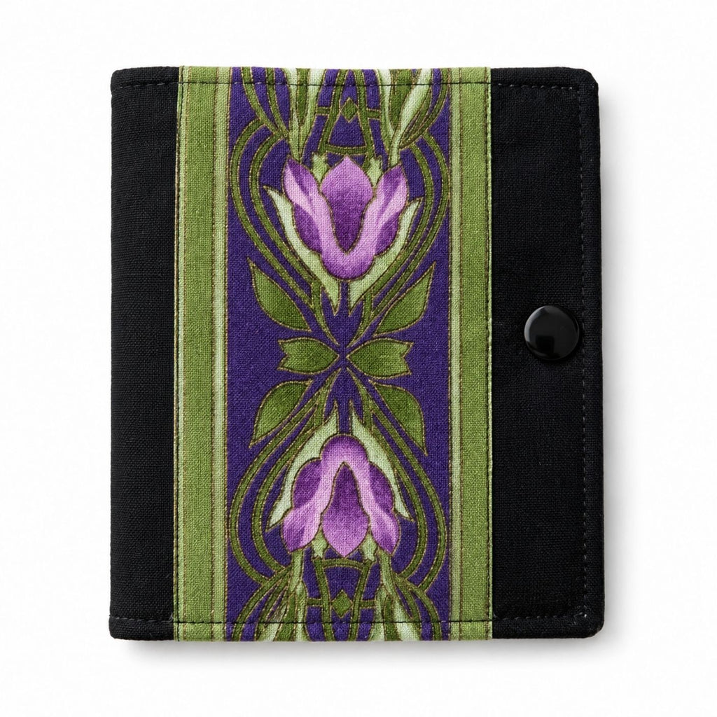 Needle Case with purple floral design on a green and black background