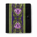Needle Case with purple floral design on a green and black background
