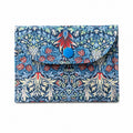 Blue Snakeshead Lily Cotton Card Wallet with a blue button on a white background