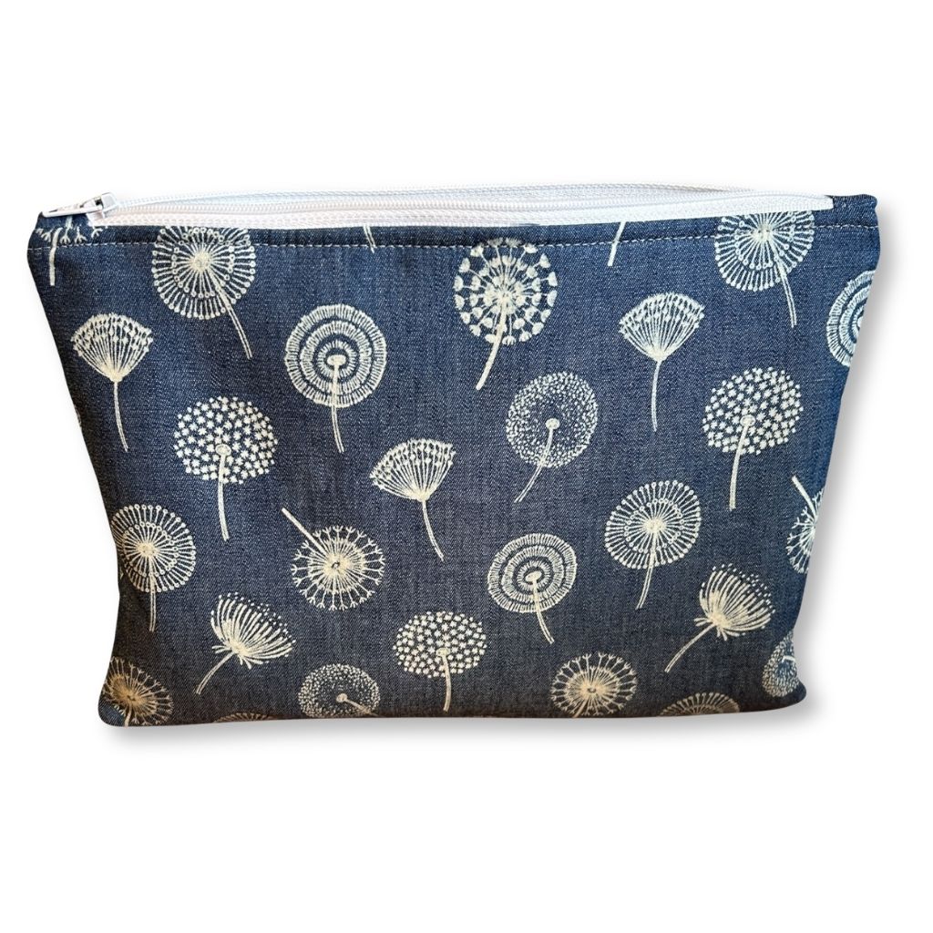 Blue pouch with white dandelion pattern on a white background