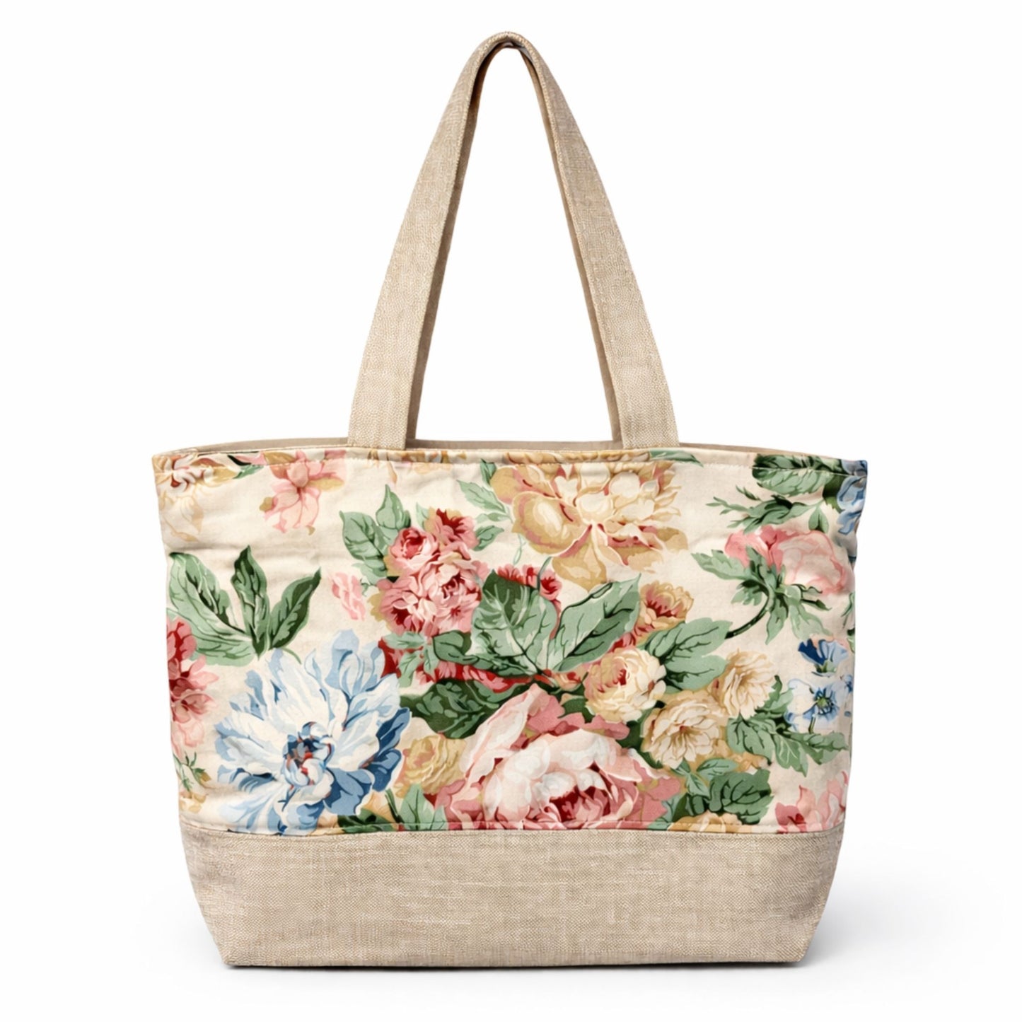 Floral tote bag with beige handle and base on a white background