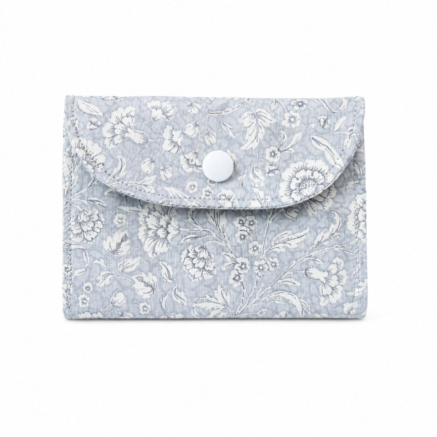 Floral patterned card wallet  with a button on a white background