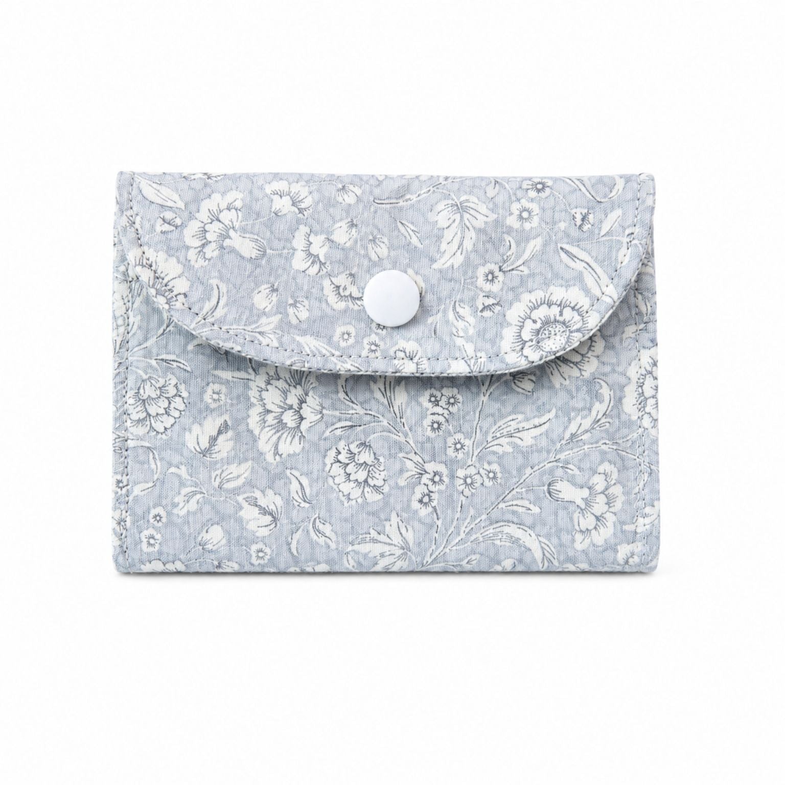 Floral patterned card wallet  with a button on a white background