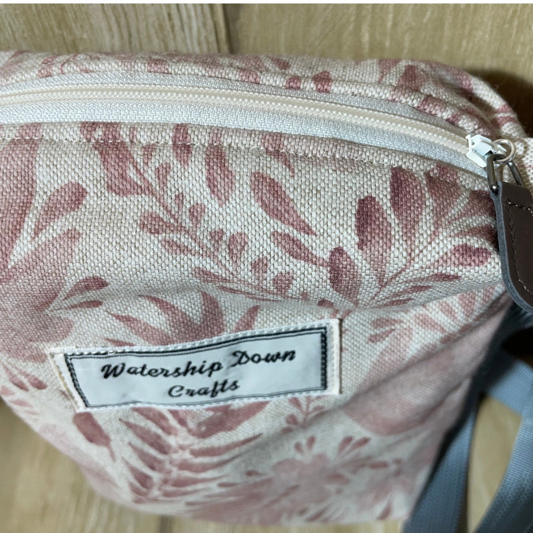 small crossbody bag made from leaves and flowers printed canvas zip detail