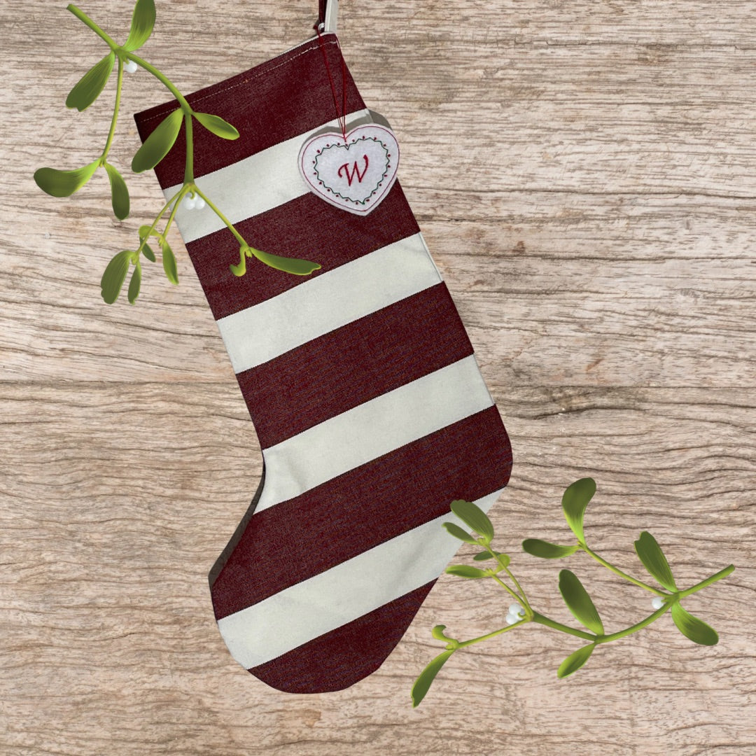 Handmade cranberry and white striped Christmas stocking