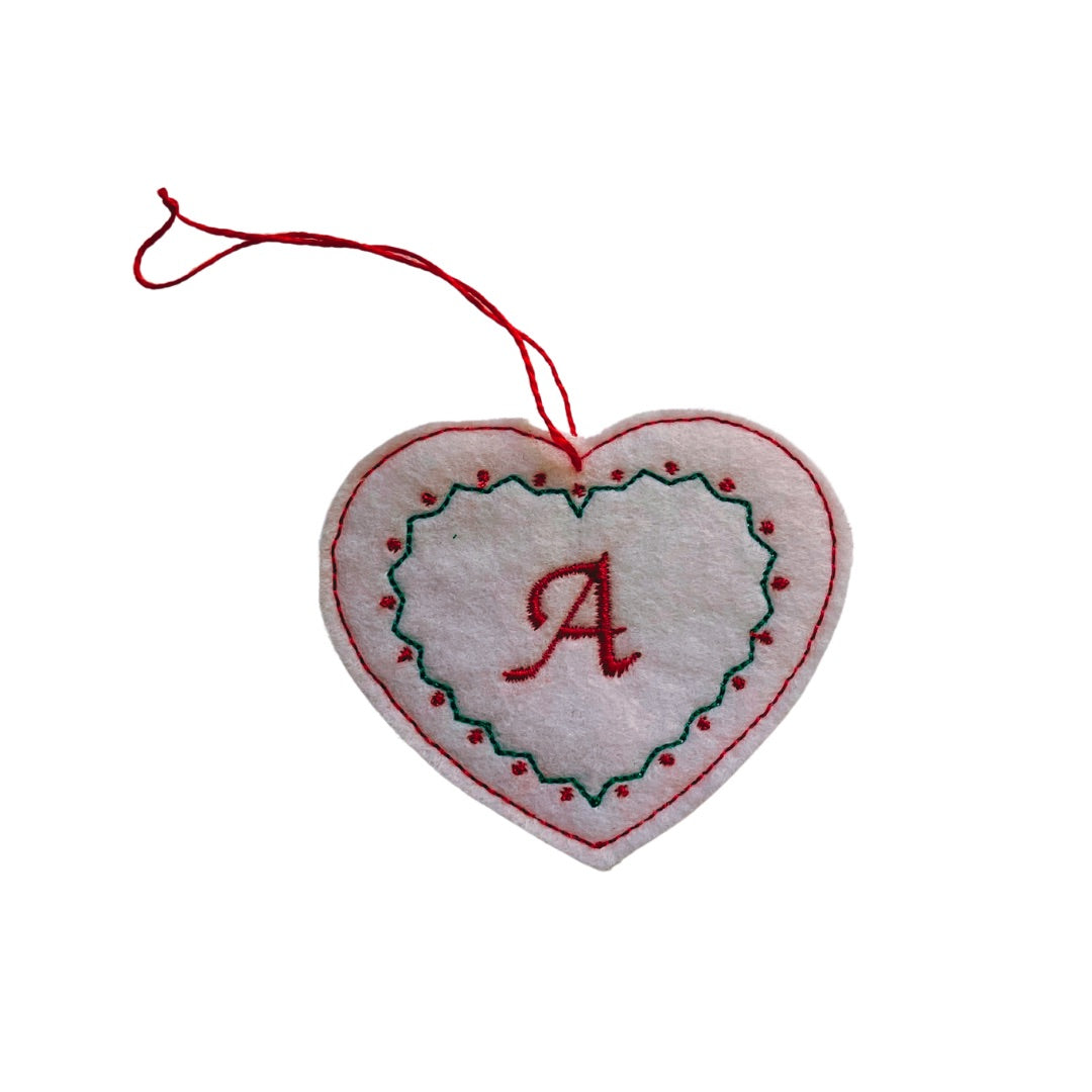 White felt heart with embroidered initial gift tag