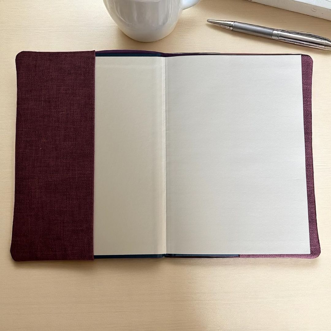 Inside view of the purple moon gazing hare A5 notebook cover, showing the replaceable hardback ruled notebook with blank open pages.