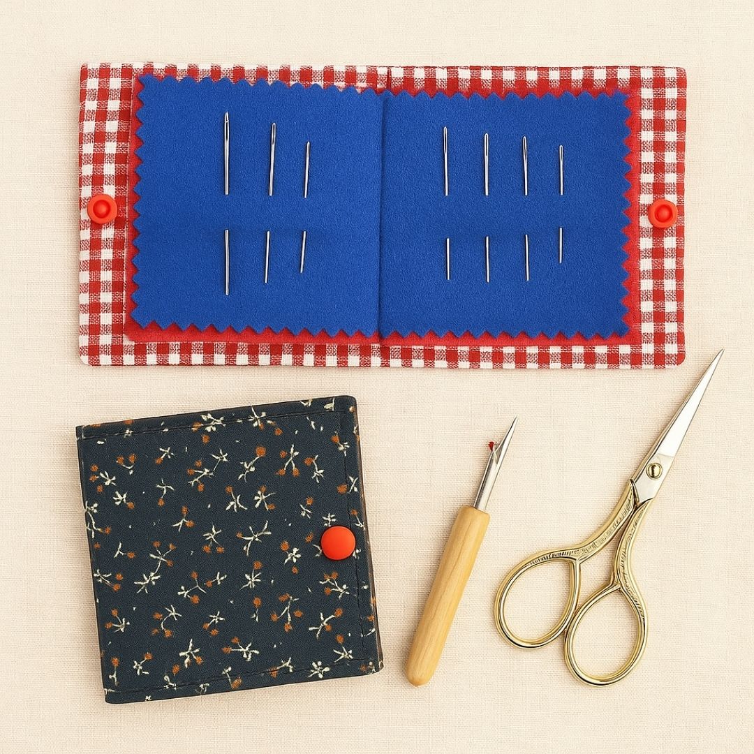 Pincushion with pins, a crochet hook, and scissors on a beige background
