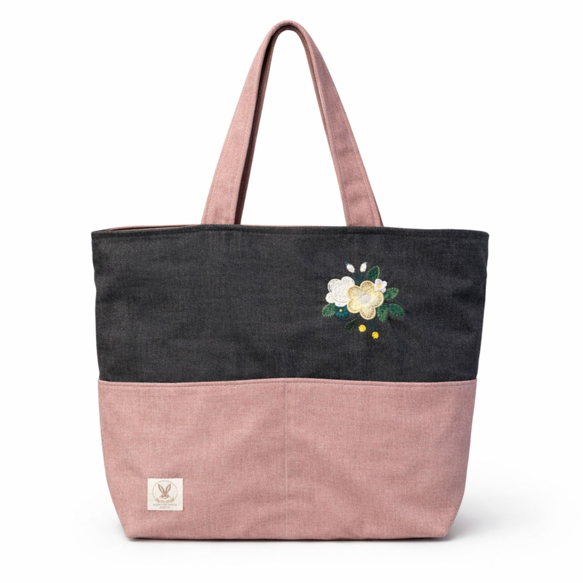 Tote bag with floral embroidery on a white background