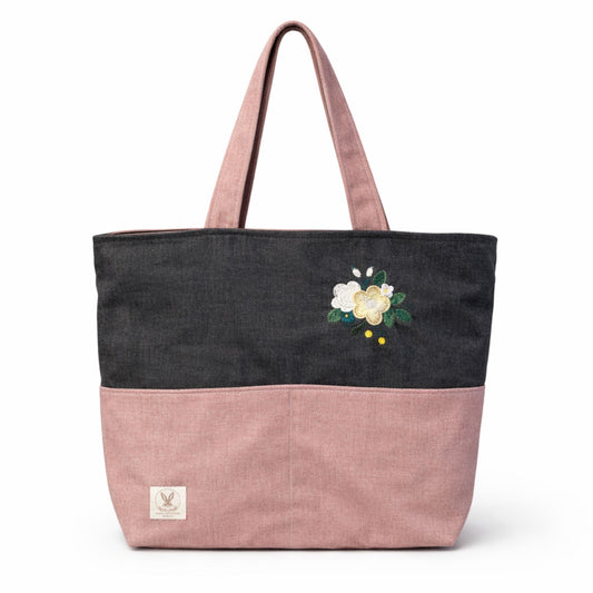 Tote bag with floral embroidery on a white background