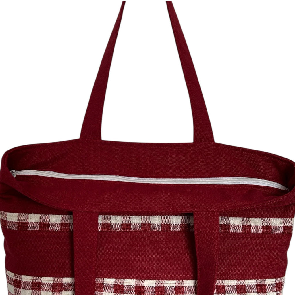 Red tote bag with checkered pattern on a white background