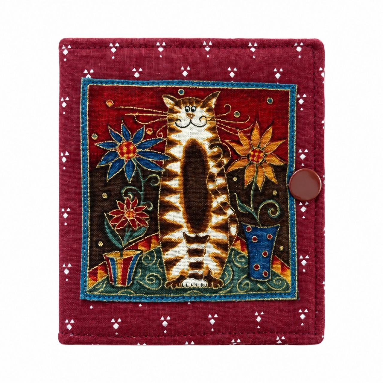 Needle case with a cat design on a red background