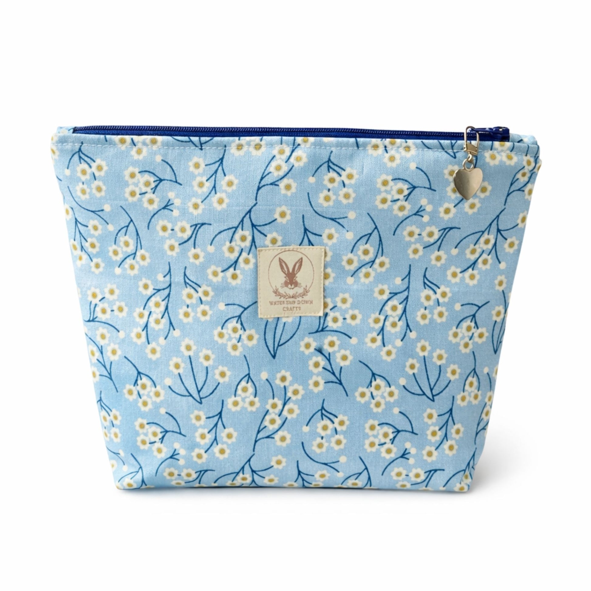 Floral-patterned pouch with a visible brand logo on a white background