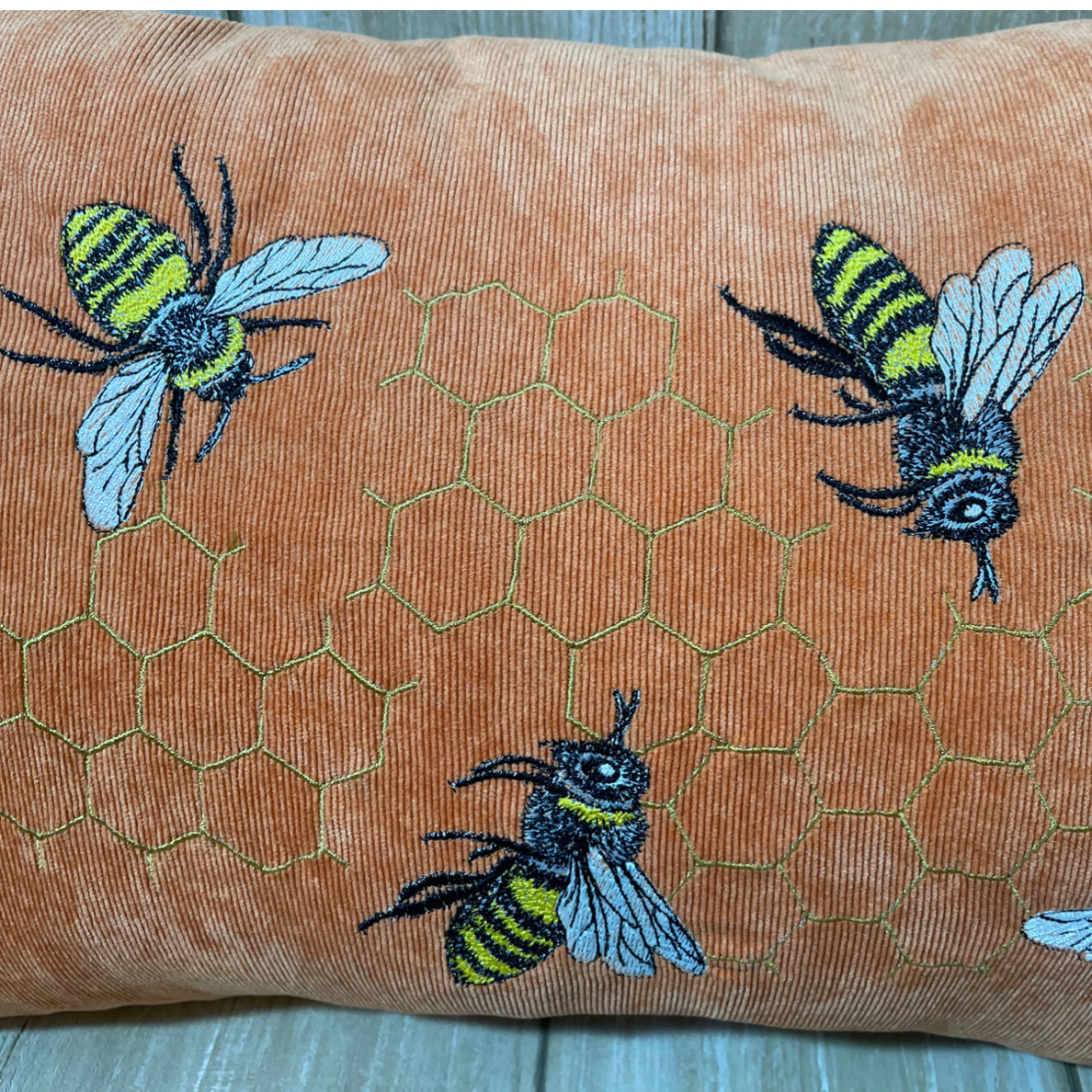 Bee Cushion burnt orange corduroy